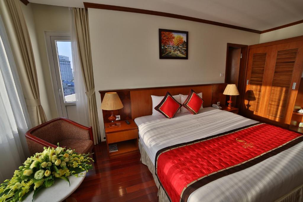 Postel nebo postele na pokoji v ubytování Sunny Hotel 1