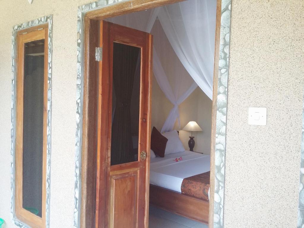 Postel nebo postele na pokoji v ubytování Molleh Guest House