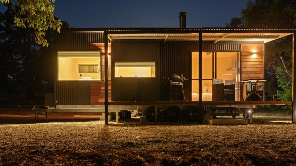a house with a large window on the side of it at Crown Equine Retreat in North Dandalup
