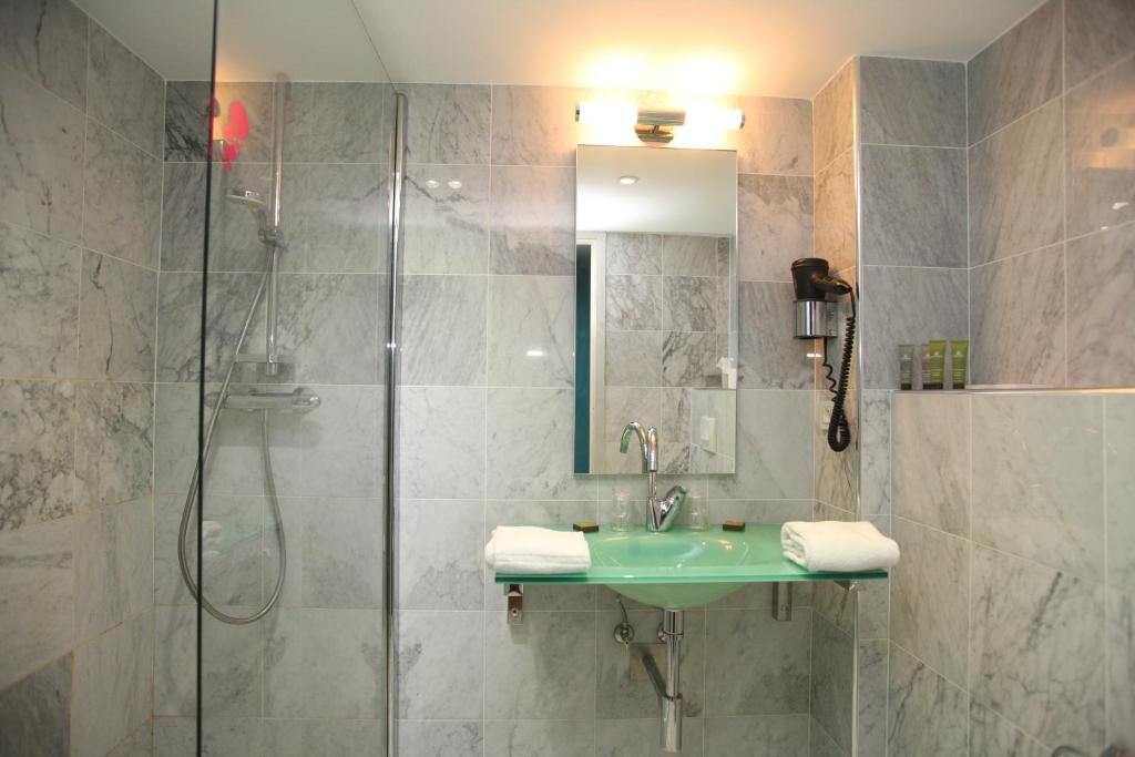 Koupelna v ubytování Hotel Balanea
