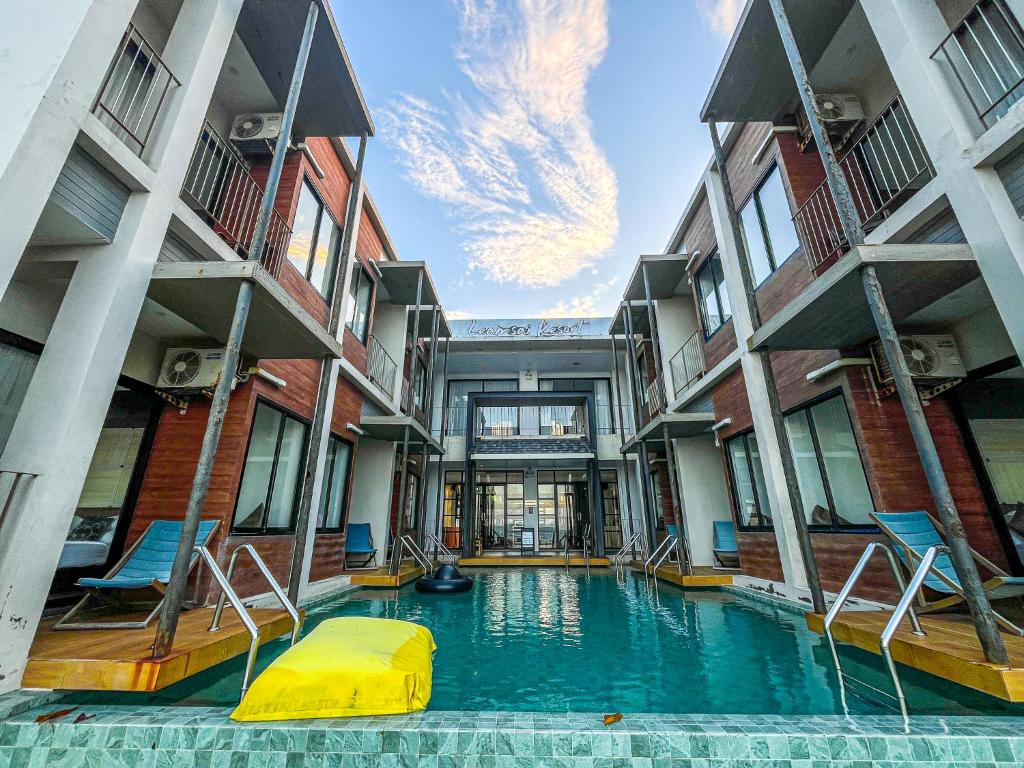 a swimming pool in the middle of a building at Leamsai Beach Resort in Suratthani
