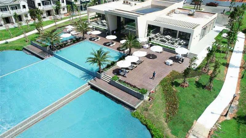 an aerial view of a house with a swimming pool at CASA Villa NOVAWORLD Phan Thiet in Phan Thiet