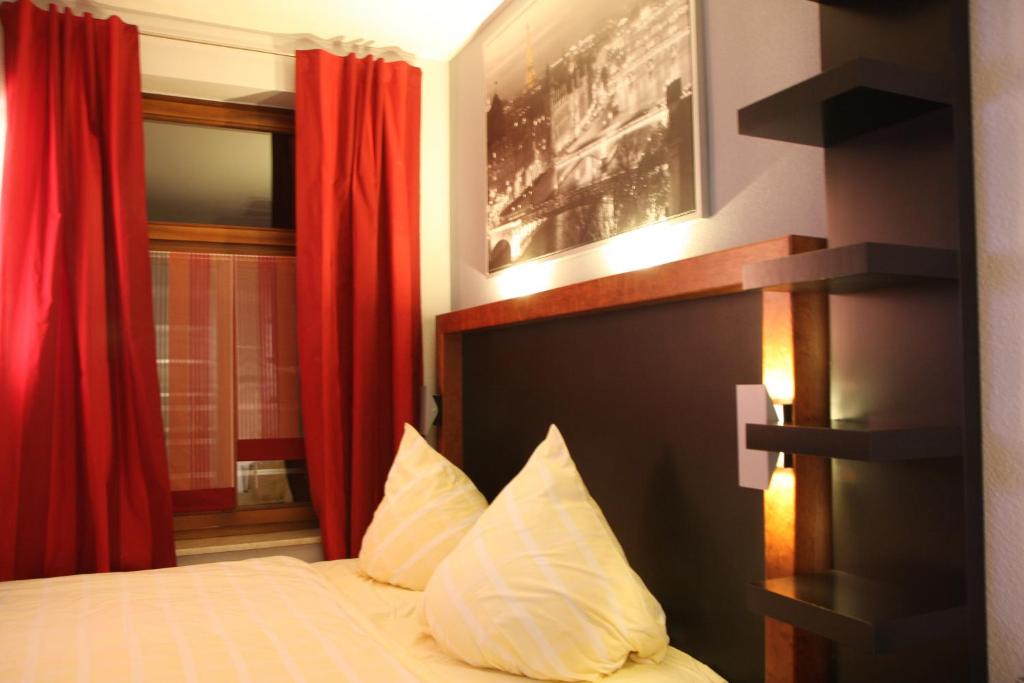 Postel nebo postele na pokoji v ubytování SL'otel - Das StadtHotel - voll Klimatisiert