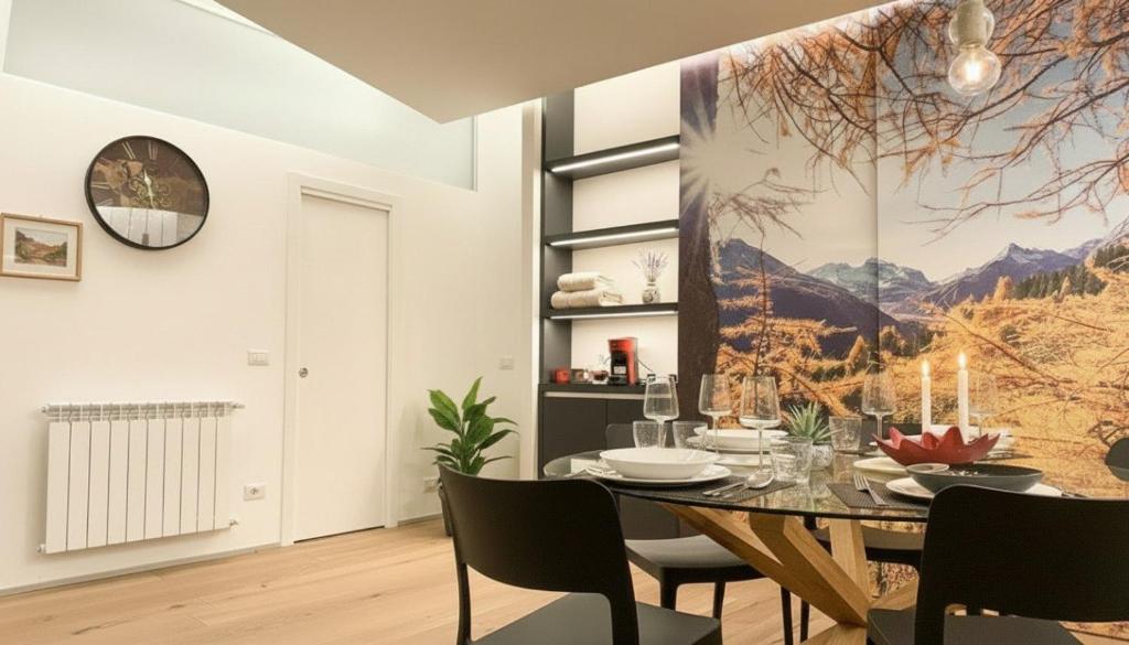 a dining room with a table and chairs at Dusdei 4 - monolocale nel centro di Sondrio in Sondrio