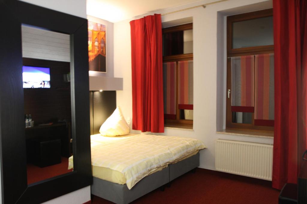 Postel nebo postele na pokoji v ubytování SL'otel - Das StadtHotel - voll Klimatisiert