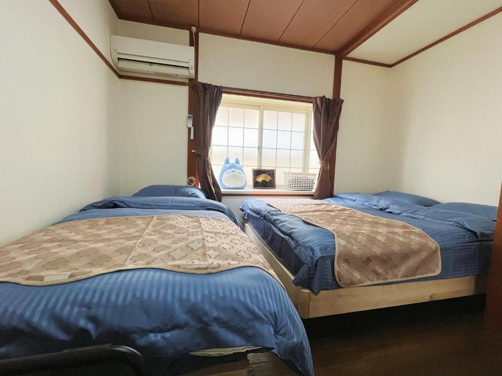 2号房 閑静な住宅街でご宿泊ください 天神博多巨蛋に直行するバスがあります