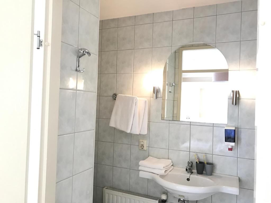 Koupelna v ubytování Hotel van Oppen