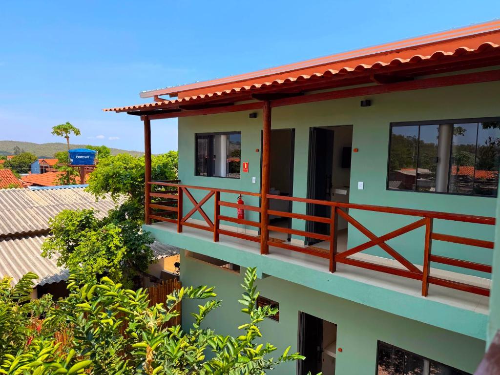 a view of a house with a balcony at Ypê Hospedagem II in Sao Jorge
