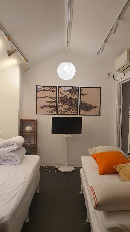 Postel nebo postele na pokoji v ubytování Nouhastay