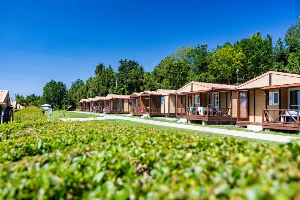 a row of cabins in a resort at Camping Deva in Deva