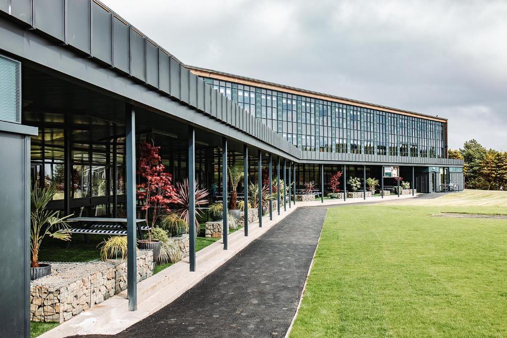 a large building with a lawn in front of it at For Students Only Space St Andrews in St. Andrews
