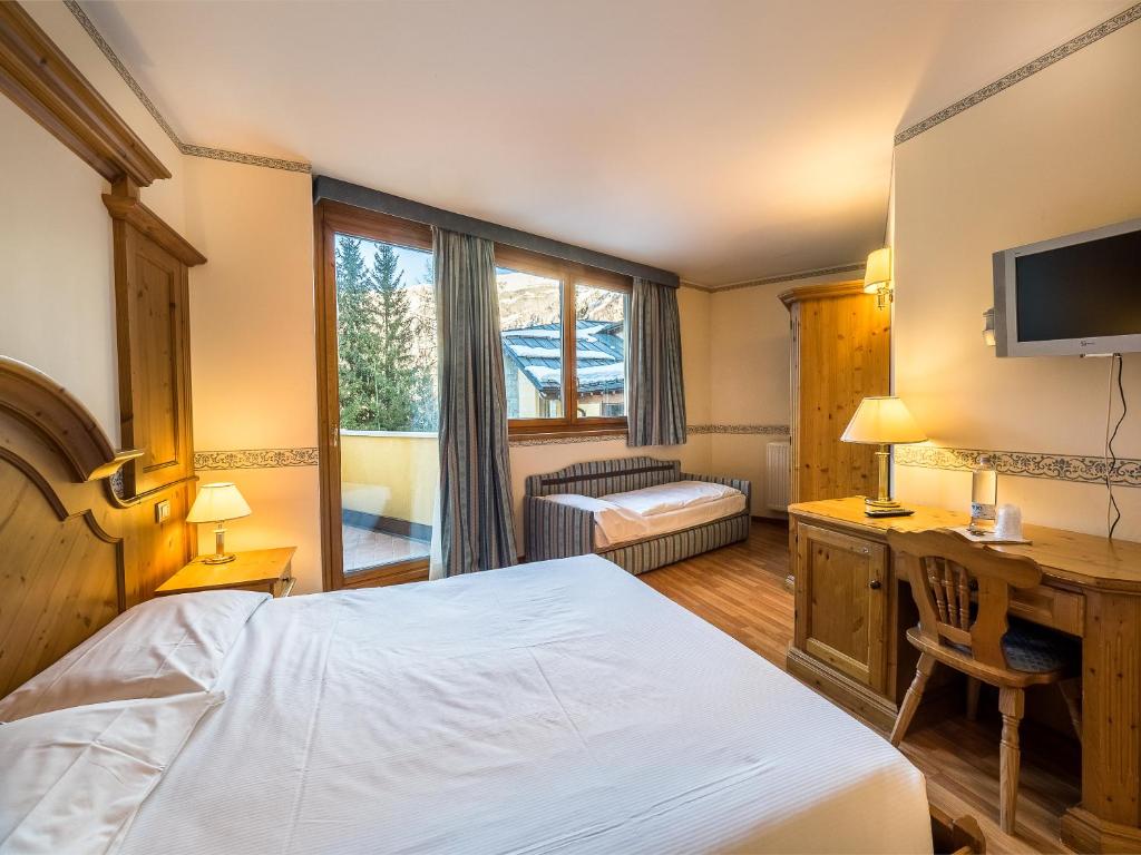 Postel nebo postele na pokoji v ubytování Park Hotel