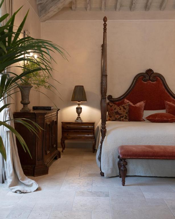Llit o llits en una habitació de Borgo Santo Pietro