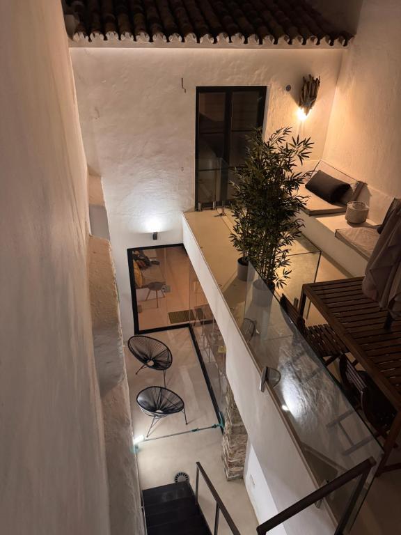 an image of a staircase in a building at Unique Townhouse with rooftop pool in Estepona