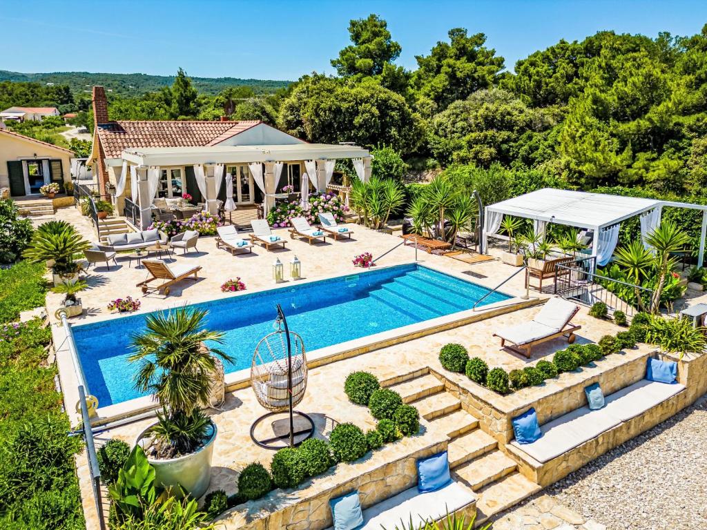 an aerial view of a swimming pool in a house at Holiday Home Villa Mutnik by Interhome in Mirce