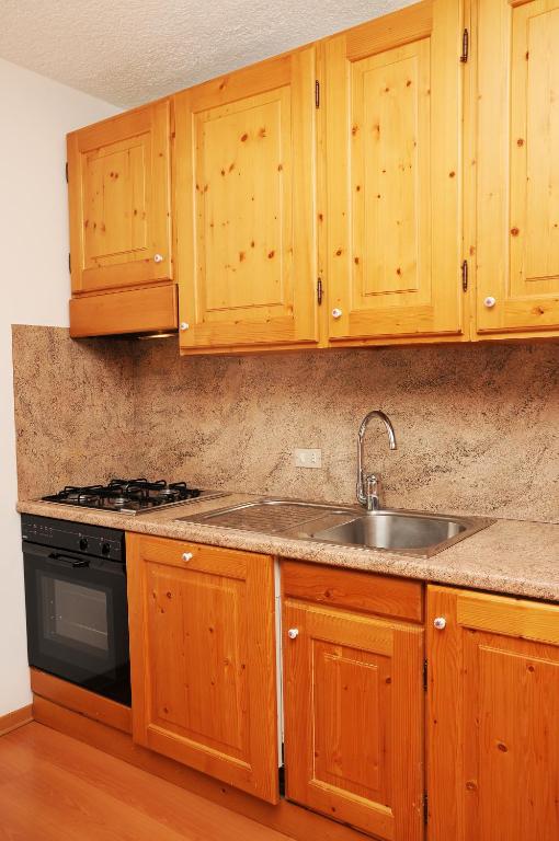 Kuchyň nebo kuchyňský kout v ubytování Residence Marisol Camere & Appartamenti - Mezzana Centre