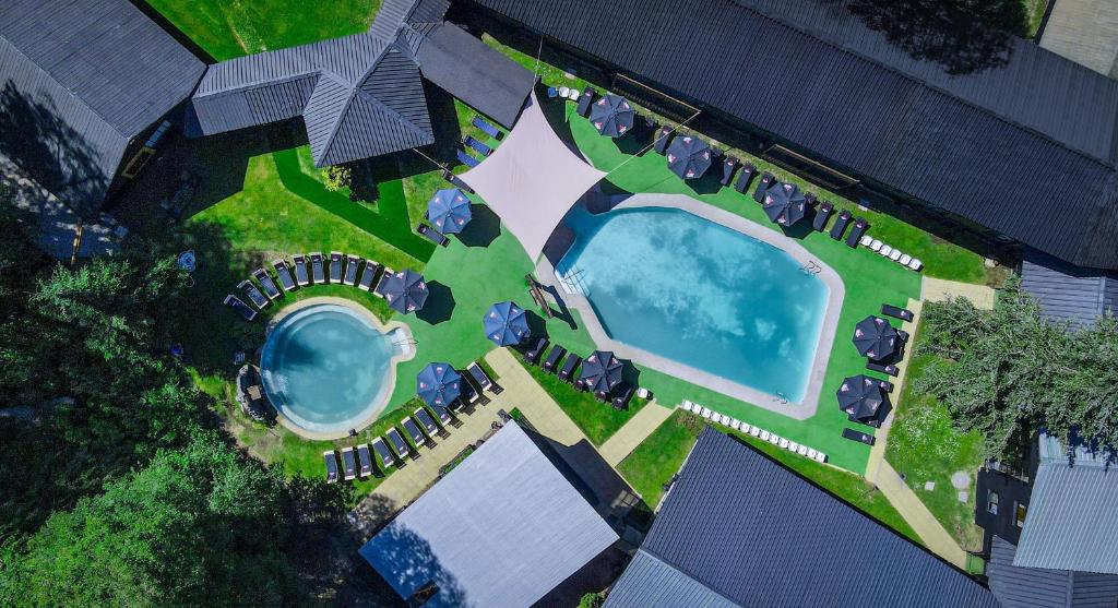 an overhead view of a swimming pool in a yard at Hotel Nevados de Chillan in Nevados de Chillan
