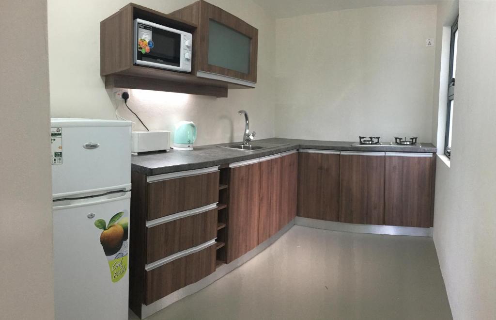 Kuchyň nebo kuchyňský kout v ubytování Valmarin Seafront Apartments