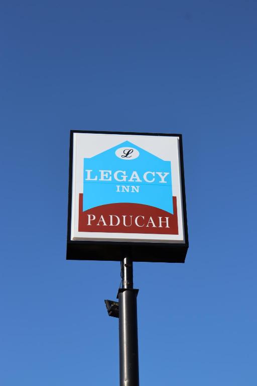 a sign for the legendary inn of pajachi at legacy inn paducah in Paducah