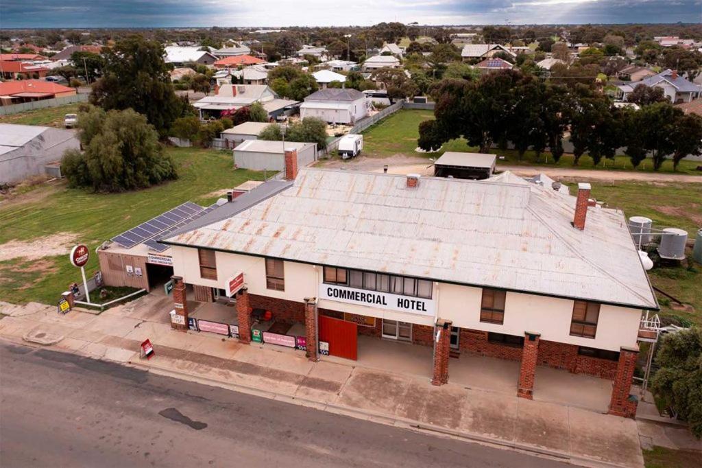 an aerial view of an old building in a town at Commercial Hotel in Birchip