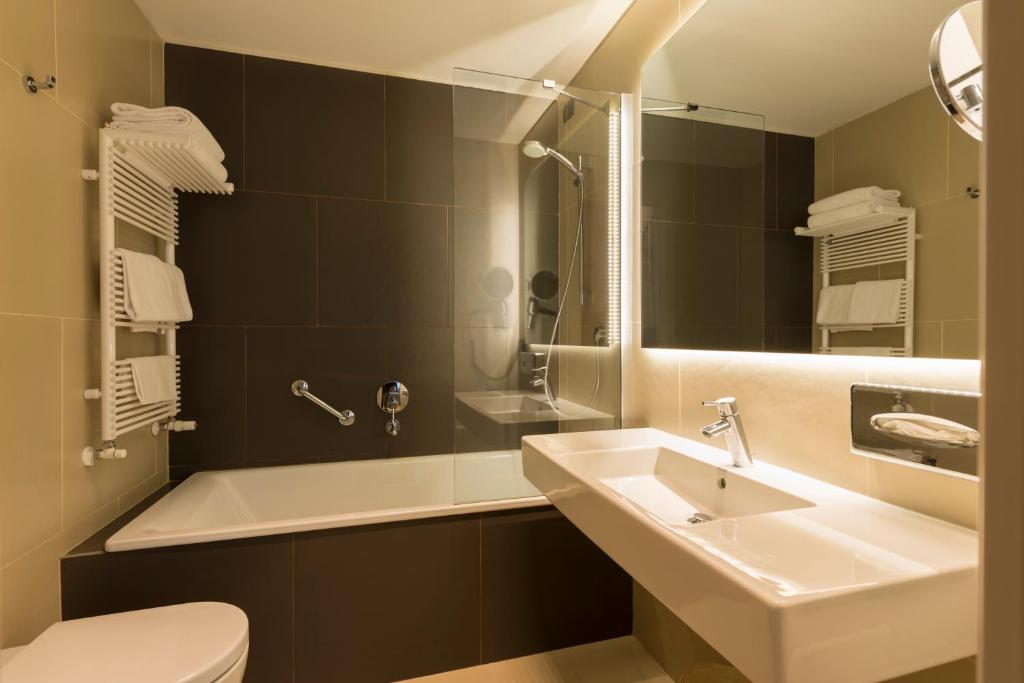Ванна кімната в Hotel Manin