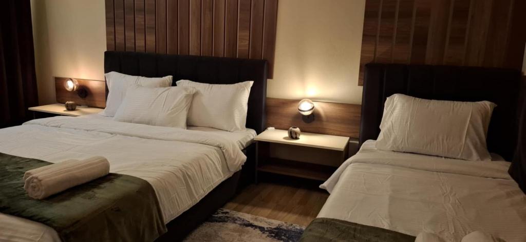 Llit o llits en una habitació de Illy Apartament