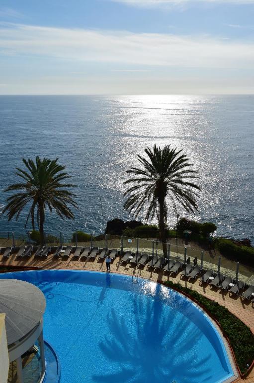 Bazén v ubytování Pestana Grand Ocean Resort Hotel nebo v jeho okolí