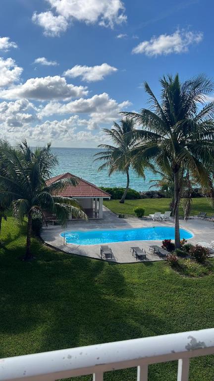 Beachfront 2BR Townhouse with Pool & Ocean View