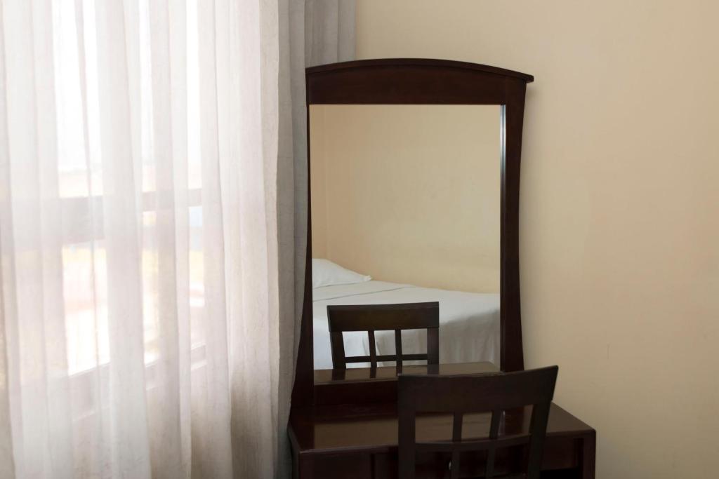 Postel nebo postele na pokoji v ubytování Hotel Novo