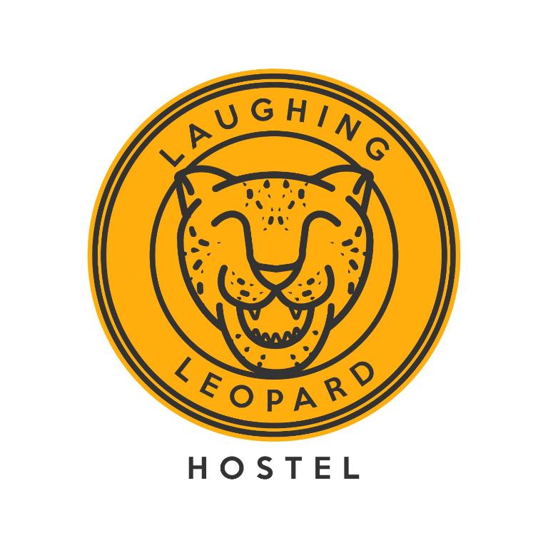 a yellow round label with a leopard head at Laughing Leopard Sigiriya in Sigiriya