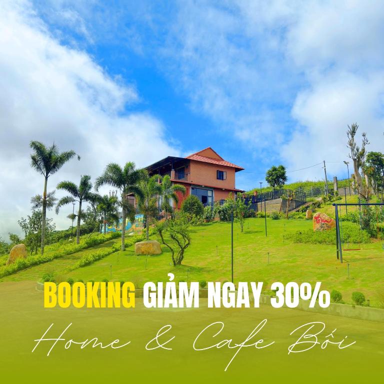 a house on a grassy hill with a house at Bối Villa Bảo Lộc in Minrong Sekang