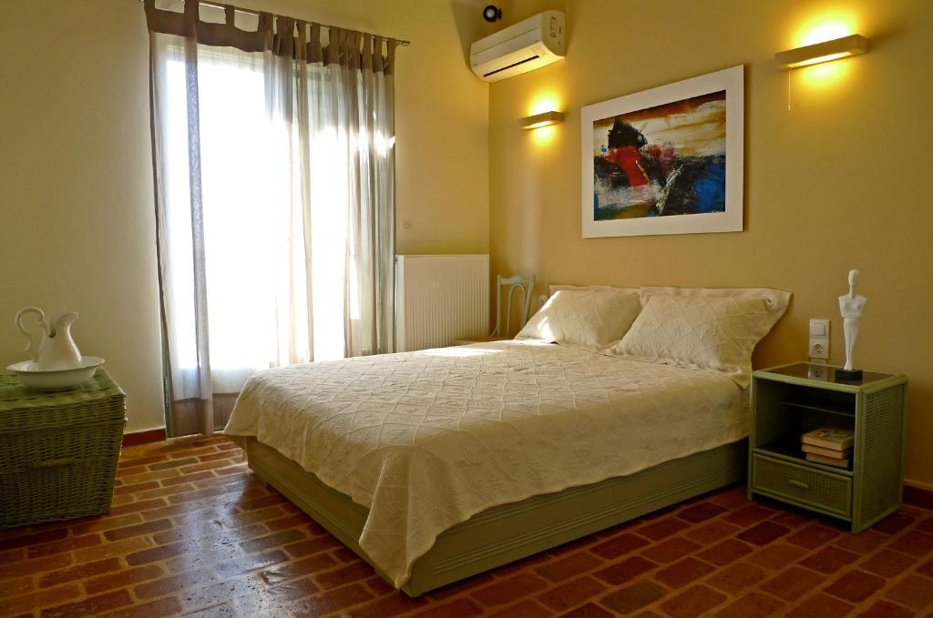Postel nebo postele na pokoji v ubytování Sea View Villa with 4 bedrooms - grECOrama