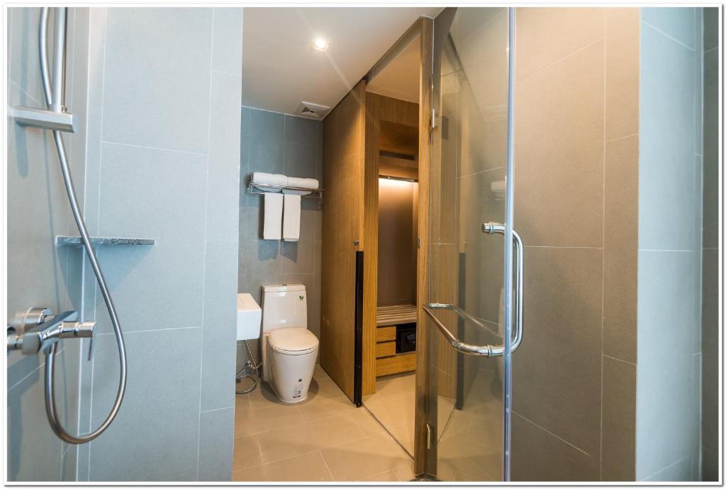 ห้องน้ำของ Sea Me Spring Tree Hotel