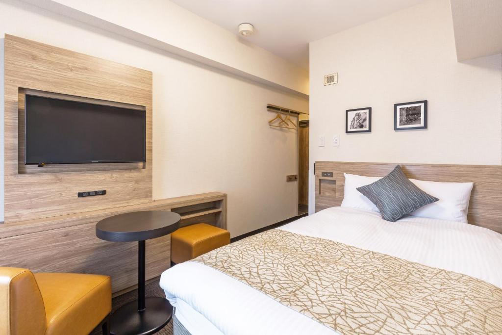 Voodi või voodid majutusasutuse Flexstay Inn Sakuragicho toas