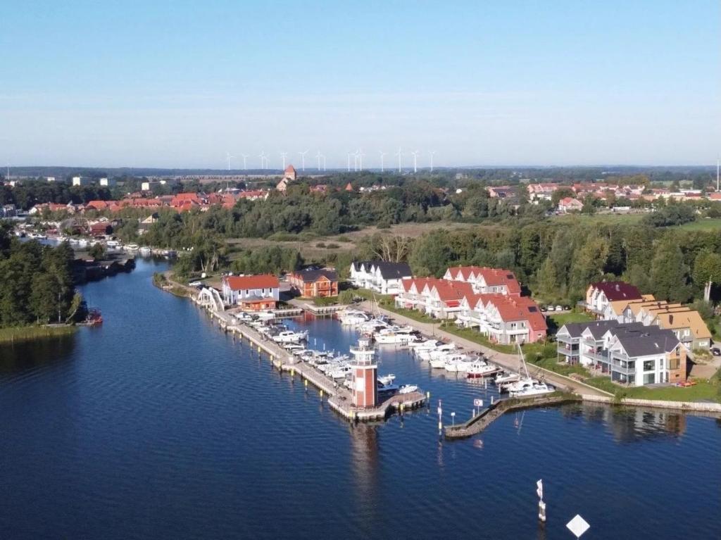 an aerial view of a marina with boats in the water at Ferienwohnungen PerlePlau in Plau am See