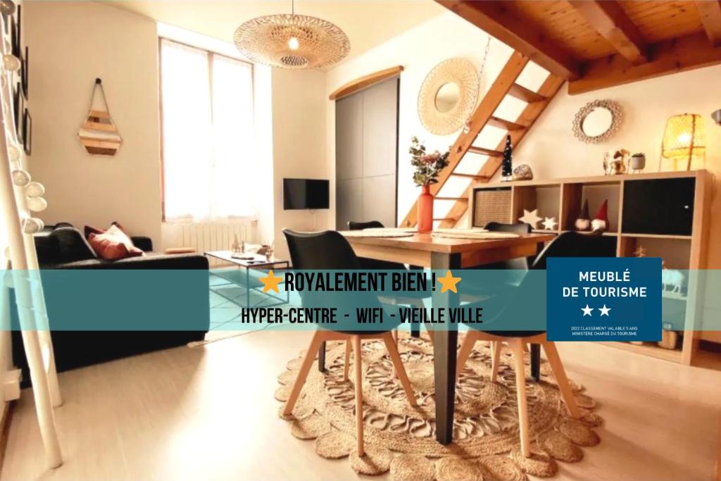 a living room with a couch and a table at ROYALEMENT BIEN ! Hyper-centre - Wifi - Vieille Ville in Annecy