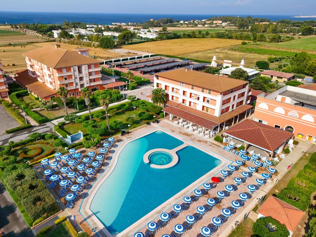 an aerial view of a resort with a swimming pool at Fruit Village Capo Rizzuto S Antonio in Capo Rizzuto