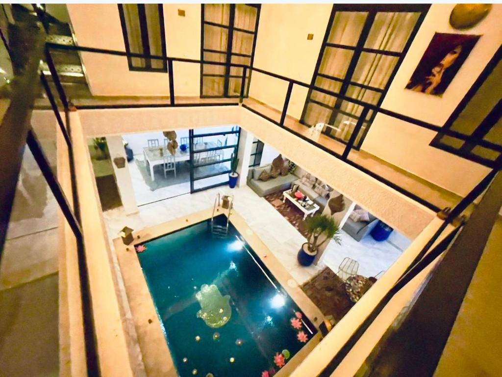 an overhead view of a swimming pool in a house at anizir tamazirtt in Irmina