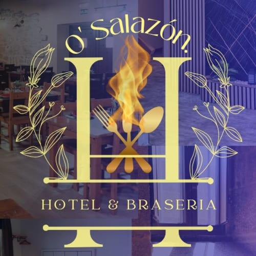 a sign for a hotel and breakfast with a fire at Hotel Rural O Salazón in Cambados