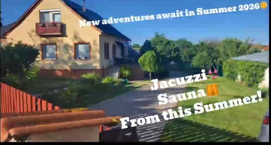 a video of a house with a sign that reads backyard summer from this summer at Marco Art Vendégház Jakuzzi, Sauna - 2025 nyártól - from this Summer 2025 in Márkó