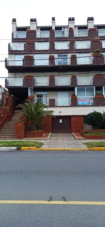 a building on the side of a street at San Berardo Brava 3 sobre costanera in San Bernardo