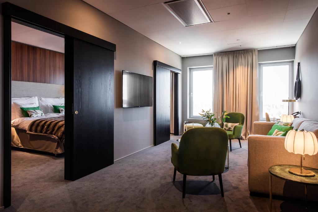 Postel nebo postele na pokoji v ubytování KUST Hotell & SPA