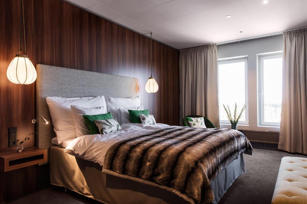 Postel nebo postele na pokoji v ubytování KUST Hotell & SPA