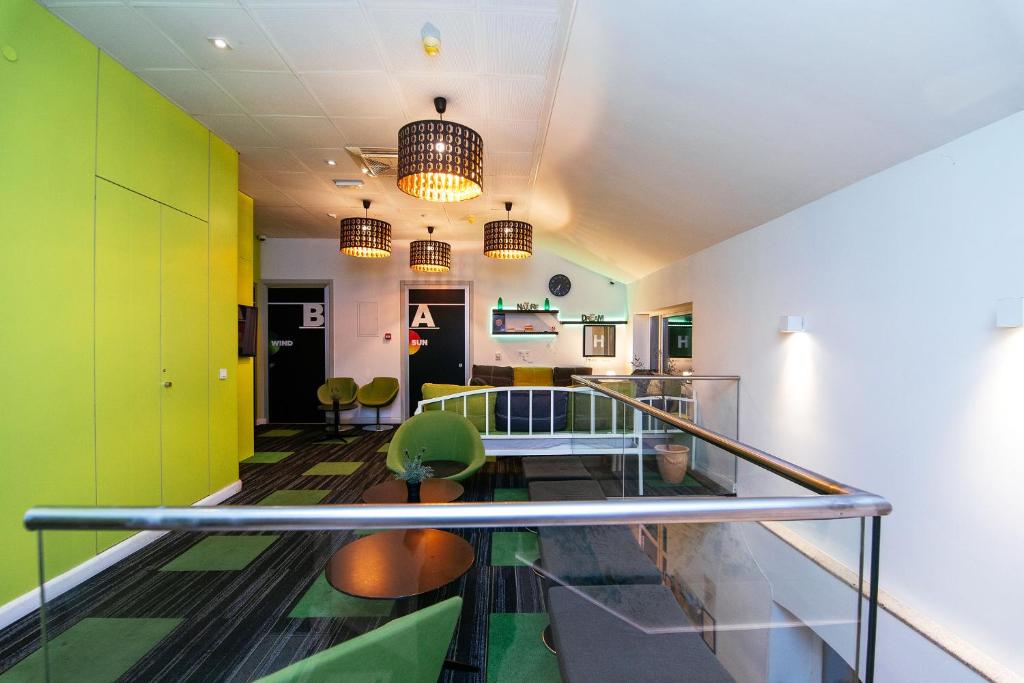 a room with green and white walls at Hostel 365 For U in Dubrovnik
