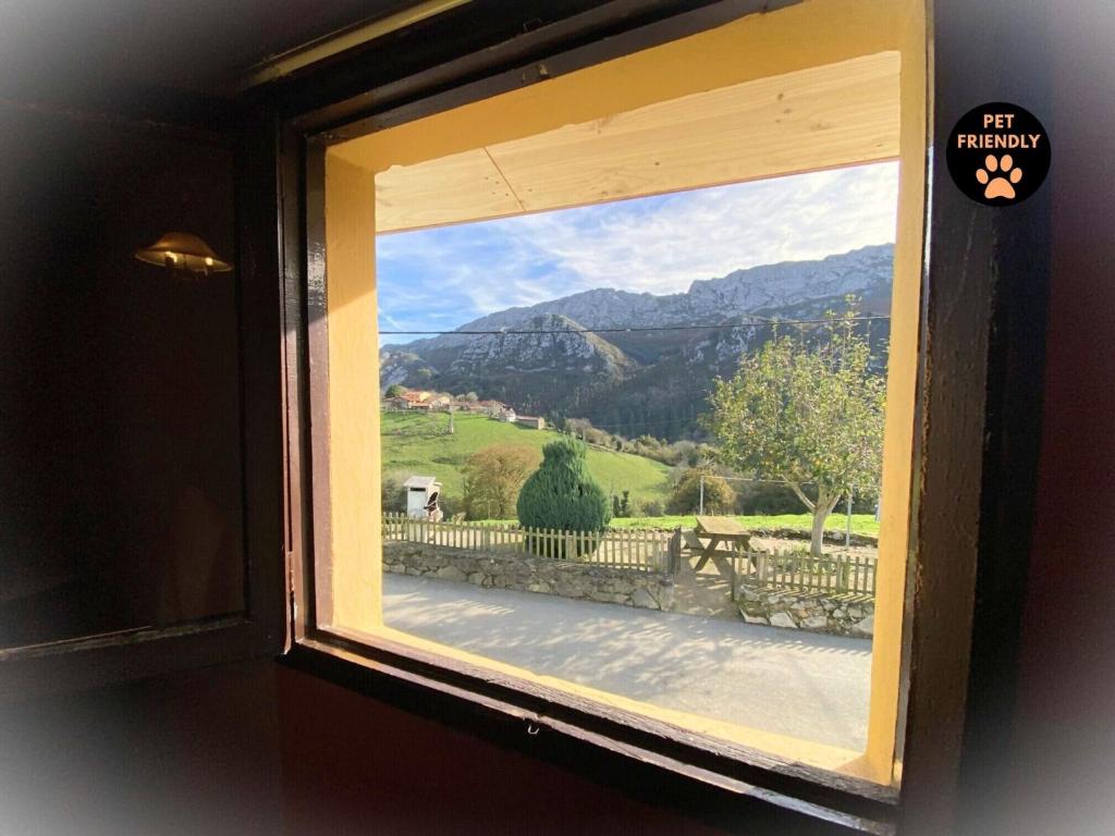a window with a view of a mountain view at Casa El Marizal 2 Arriondas VV-2862-AS in Arriondas