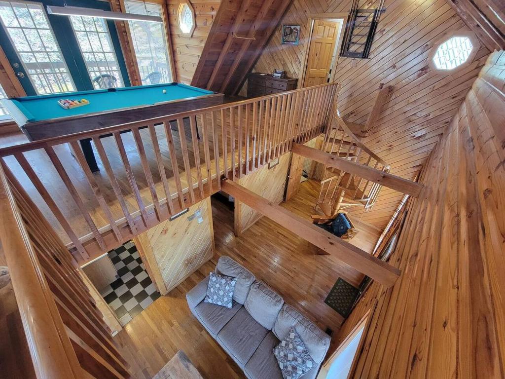 an overhead view of a wooden cabin with a pool table at Mountain Rose- Hot Tub, Pool Table, Firepit in Stanton