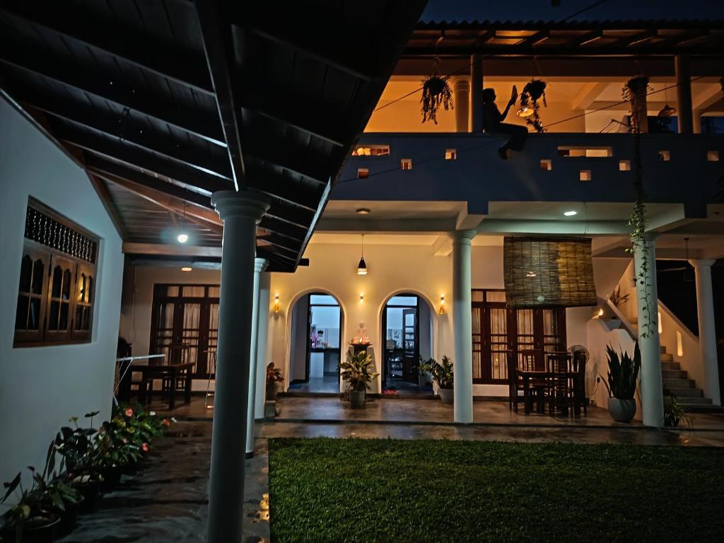 a view of a house at night at Sweet Emotion in Mirissa