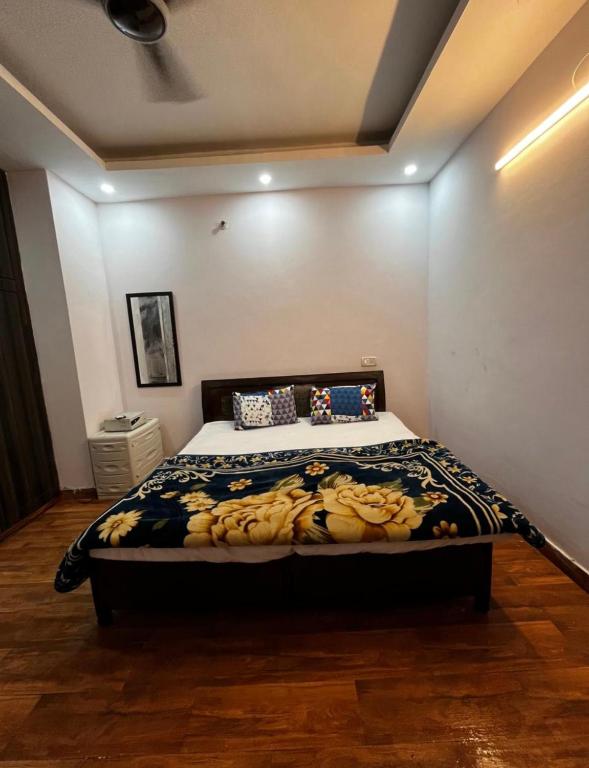 a bedroom with a bed with bananas on it at The Retreat Base in Rājpur