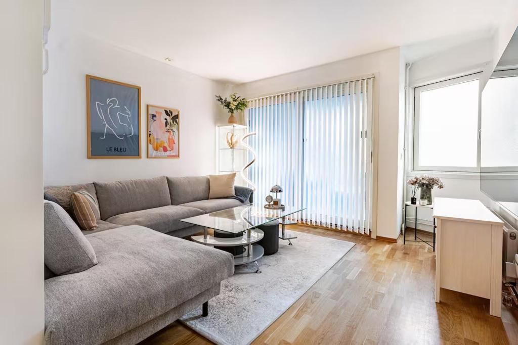 a living room with a couch and a table at Apartment in the heart of Bergen in Bergen