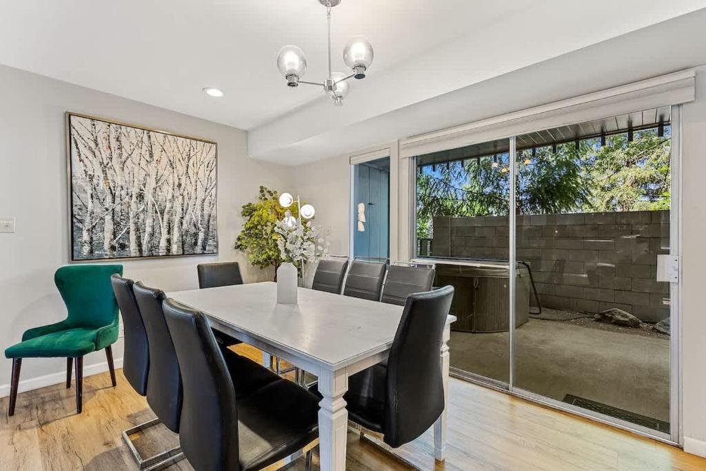a dining room with a table and chairs at High Pines Abode in Flagstaff
